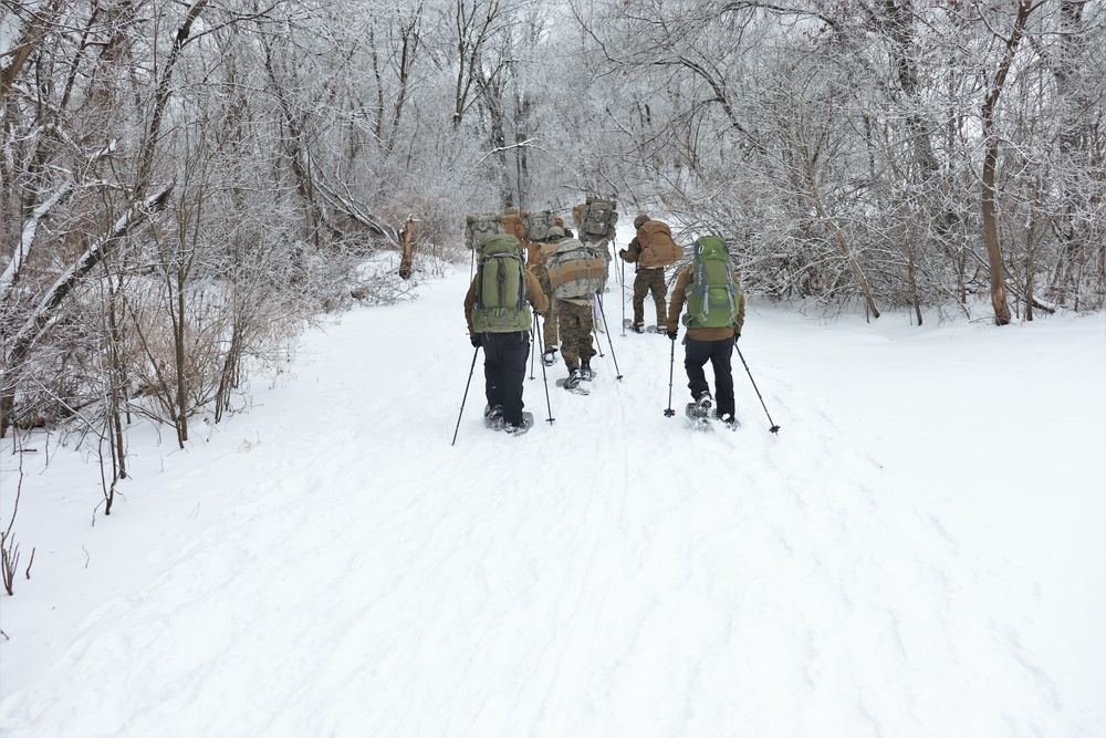 Fort McCoy CWOC class 21-02 students train using snowshoes, ahkio sleds