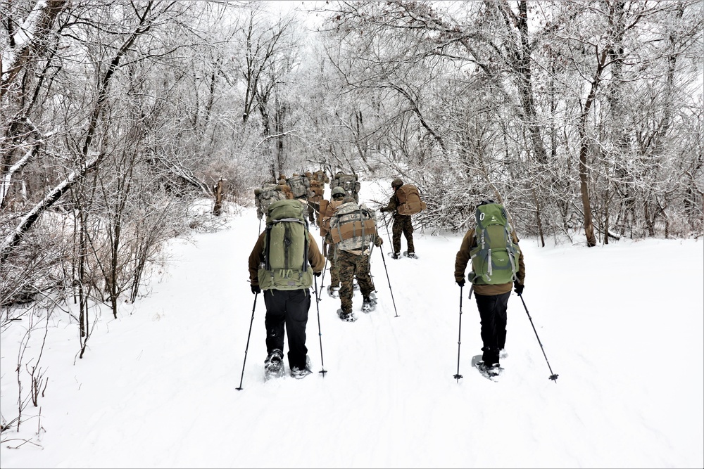 Fort McCoy CWOC class 21-02 students train using snowshoes, ahkio sleds