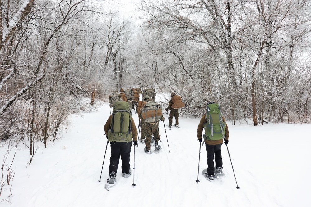 Fort McCoy CWOC class 21-02 students train using snowshoes, ahkio sleds