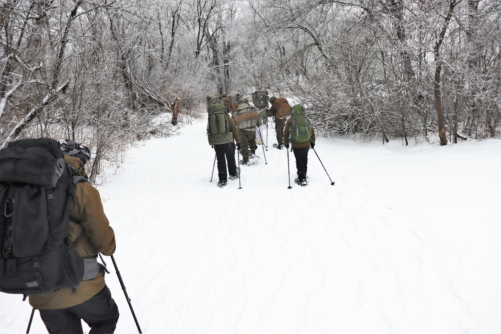 Fort McCoy CWOC class 21-02 students train using snowshoes, ahkio sleds