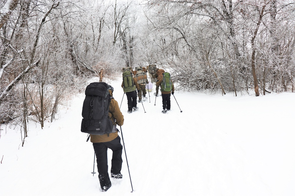 Fort McCoy CWOC class 21-02 students train using snowshoes, ahkio sleds