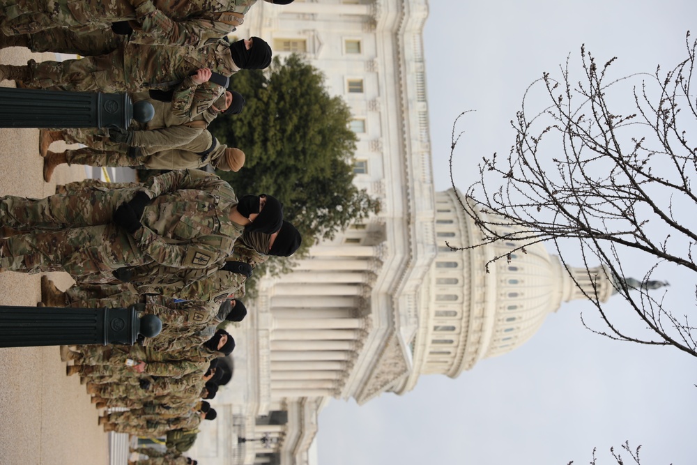 the 102nd MP Battalion prepares for a shift change.