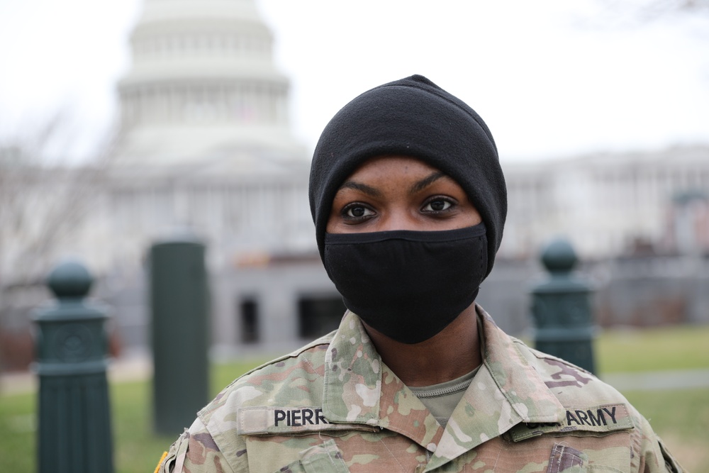 A Soldier from 508th MP Company stands guard near the Capitol.