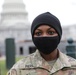 A Soldier from 508th MP Company stands guard near the Capitol.