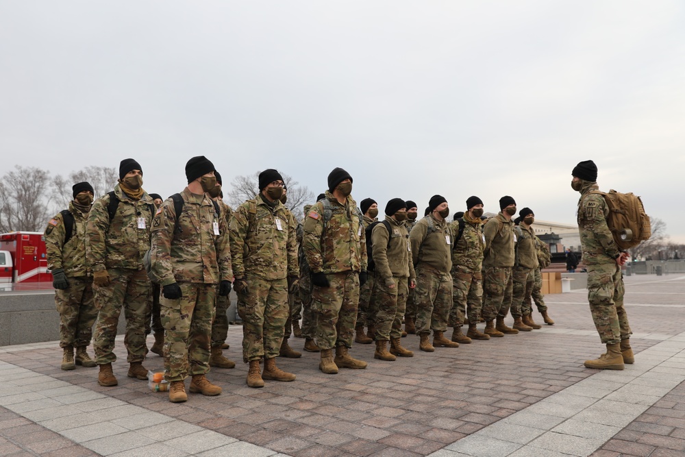 Soldiers with the 102nd MP Battalion prepare for a shift change at the Capitol.