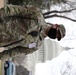 A Soldier from the 114th Infantry stands guard near the Capitol.