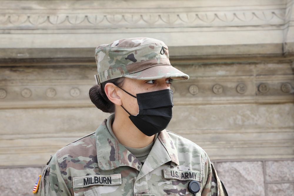 A Soldier from the 114th Infantry stands guard near the Capitol.