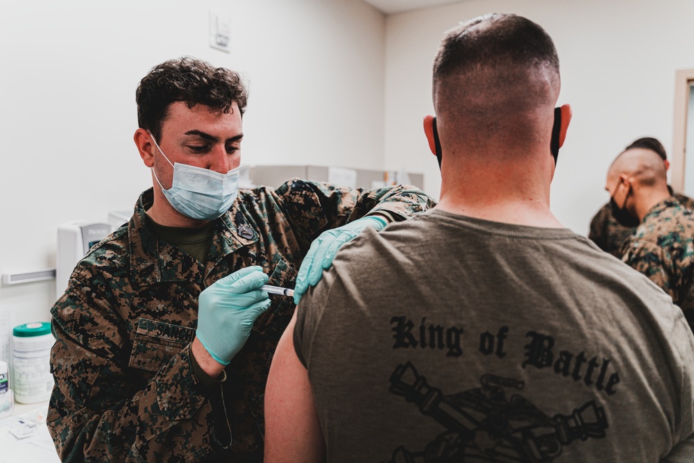 U.S. Marines with 1st Marine Division receive the Moderna SARS-CoV-2 Vaccine