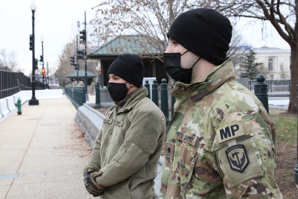 U.S. Soldiers with the 508th Military Police Company stand near the Capitol.