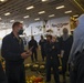 USS America (LHA 6)'s Sailor instructs group.