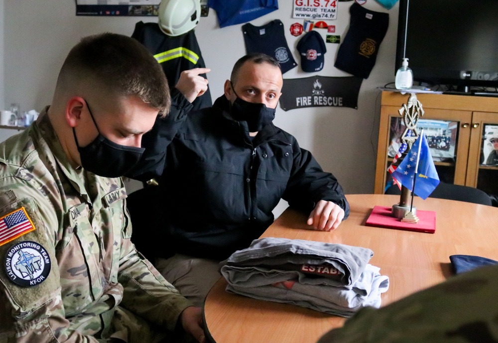 KFOR Soldier meets with local fire department