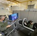 Air Force Maj. Gen. Craig D. Wills, Commander, 19th Air Force, experiences simulator