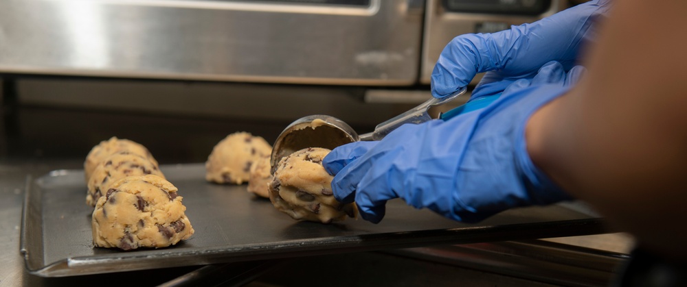 Nimitz Sailor Prepares Cookies