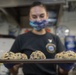 Nimitz Sailor Prepares Cookies