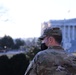 A Soldier with the Virginia National Guard stands near the Capitol building.
