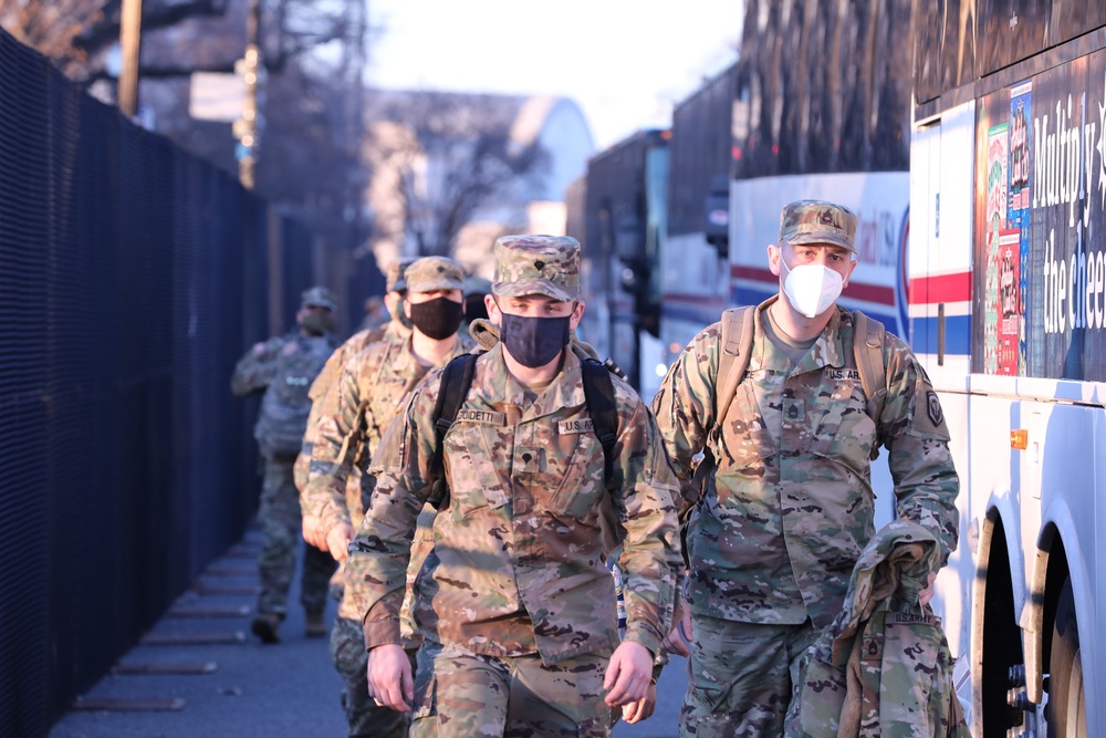 U.S. Soldiers with the New Jersey National Guard arrive for their guard shift.