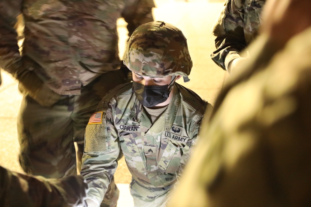 U.S. Army Sgt. Aidan Curran gives a briefing to medics near the U.S. Capitol in Washington, D.C.