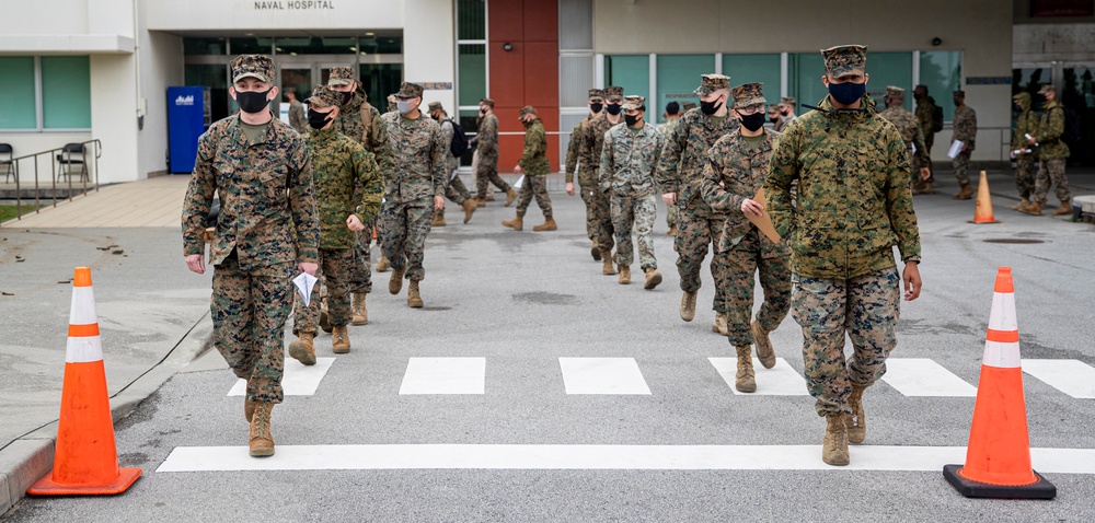 Service members across Okinawa receive the Moderna COVID-19 vaccine