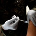 Deploying Marines and Sailors receive COVID-19 Vaccination