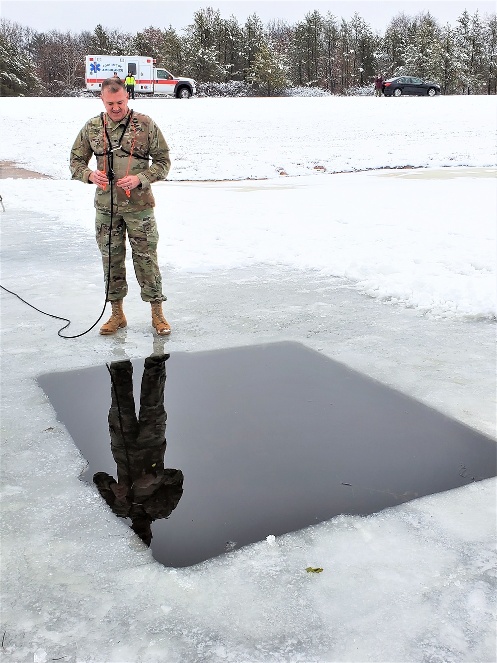Fort McCoy garrison commander takes plunge during cold-water immersion familiarization