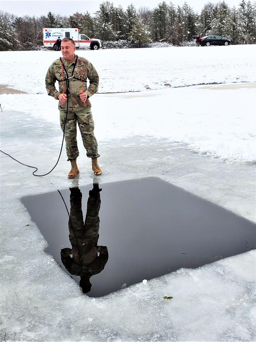 Fort McCoy garrison commander takes plunge during cold-water immersion familiarization