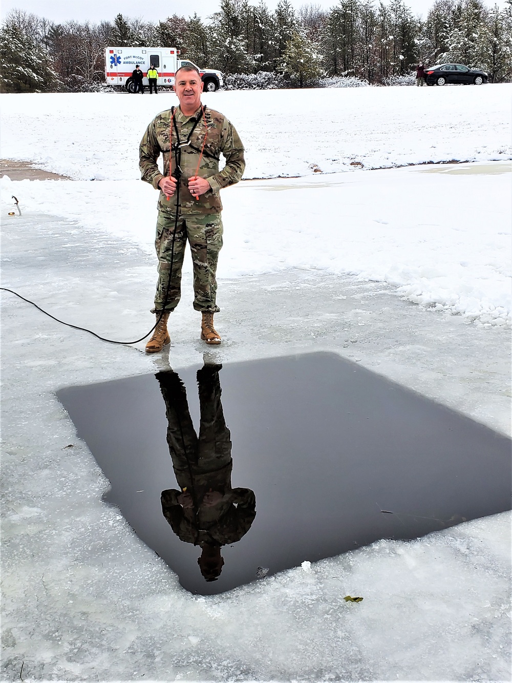 Fort McCoy garrison commander takes plunge during cold-water immersion familiarization