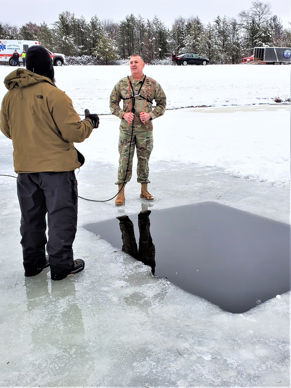 Fort McCoy garrison commander takes plunge during cold-water immersion familiarization