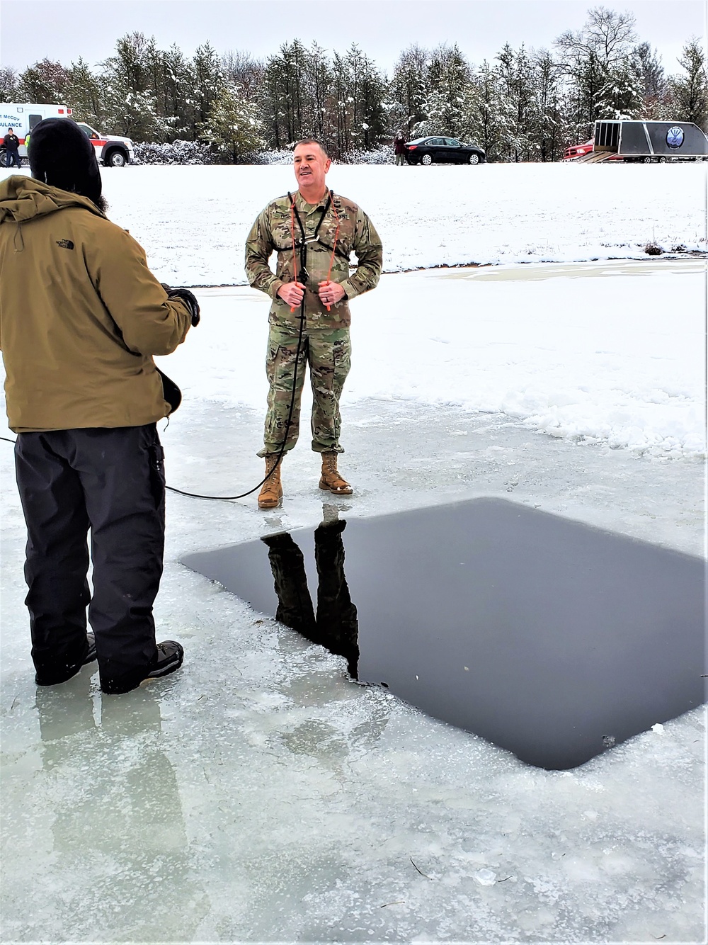 Fort McCoy garrison commander takes plunge during cold-water immersion familiarization