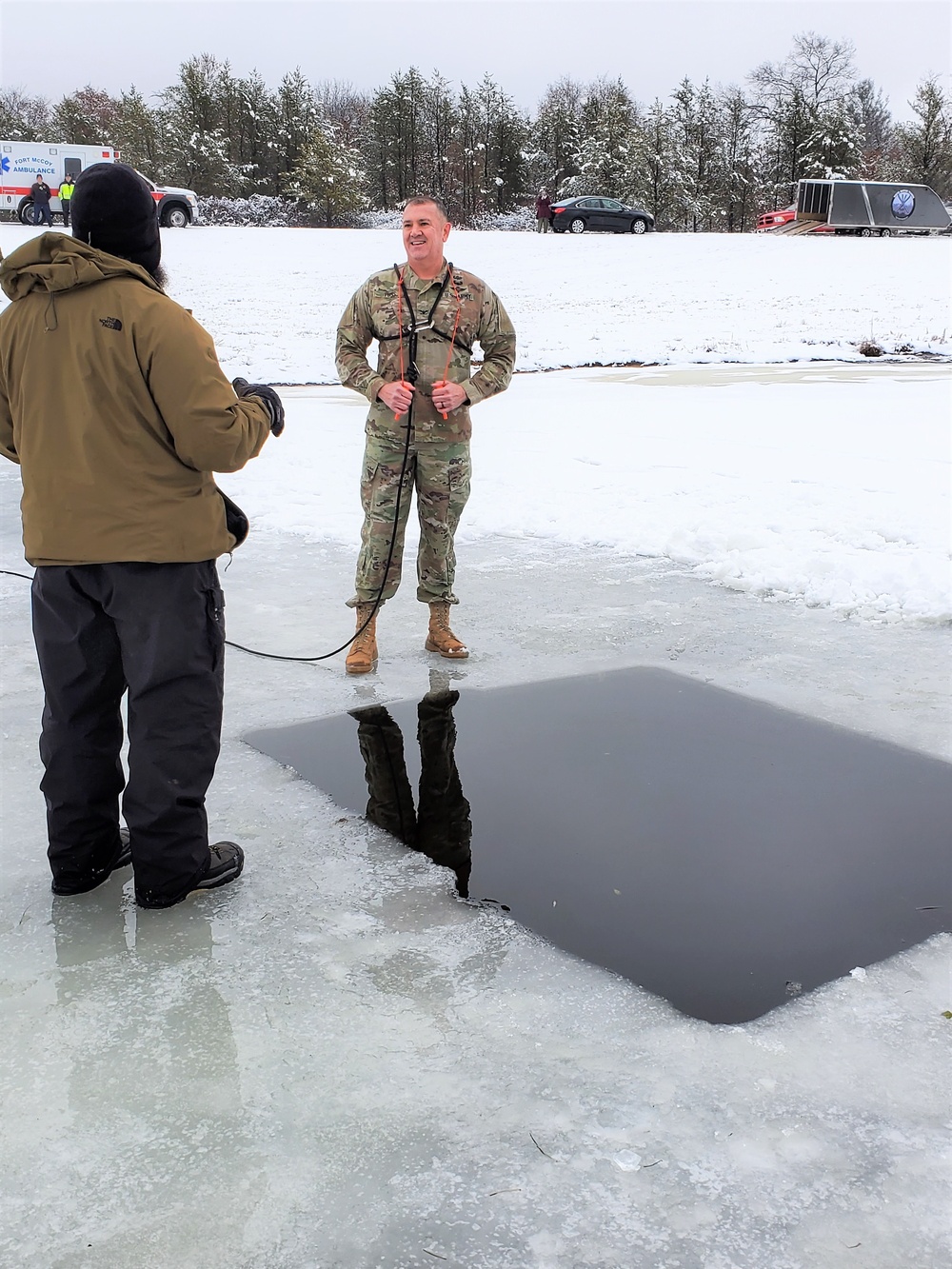 Fort McCoy garrison commander takes plunge during cold-water immersion familiarization