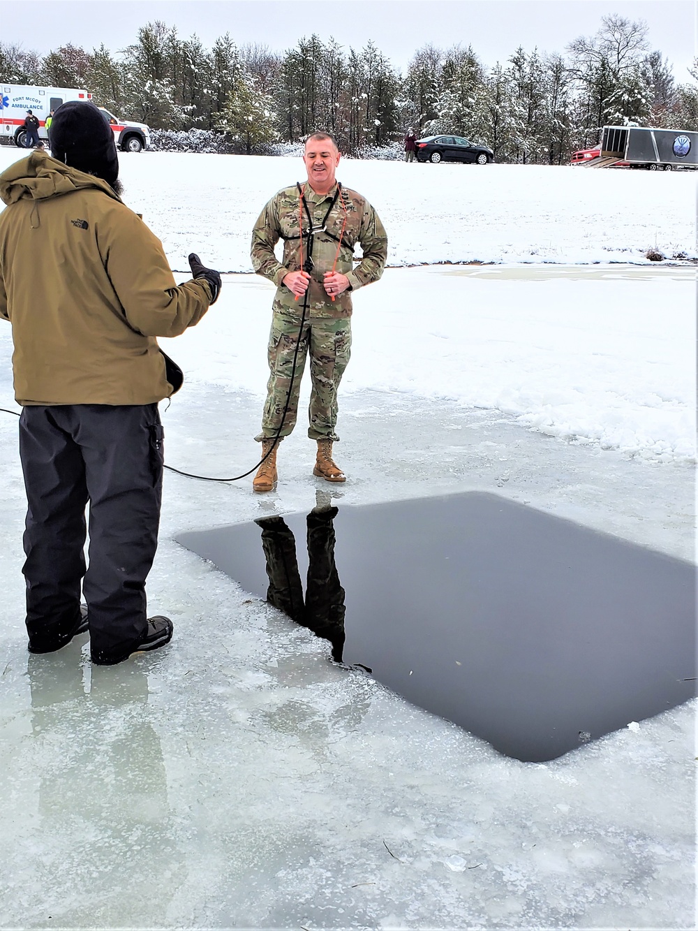 Fort McCoy garrison commander takes plunge during cold-water immersion familiarization