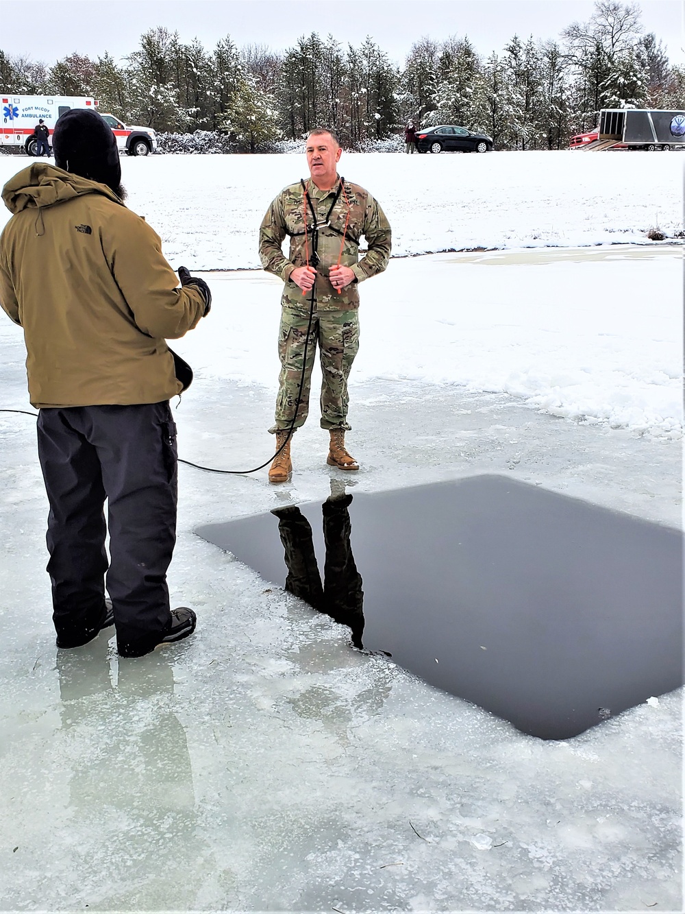 Fort McCoy garrison commander takes plunge during cold-water immersion familiarization