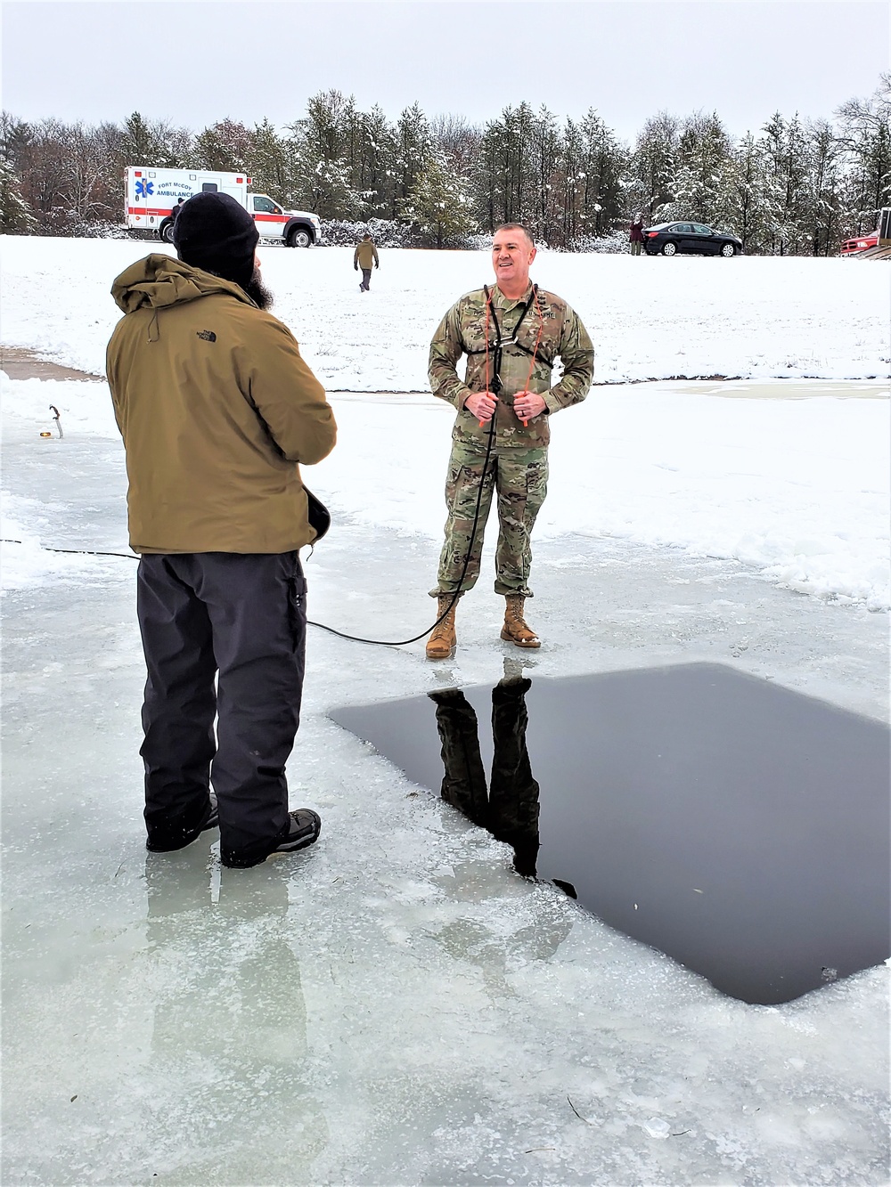 Fort McCoy garrison commander takes plunge during cold-water immersion familiarization
