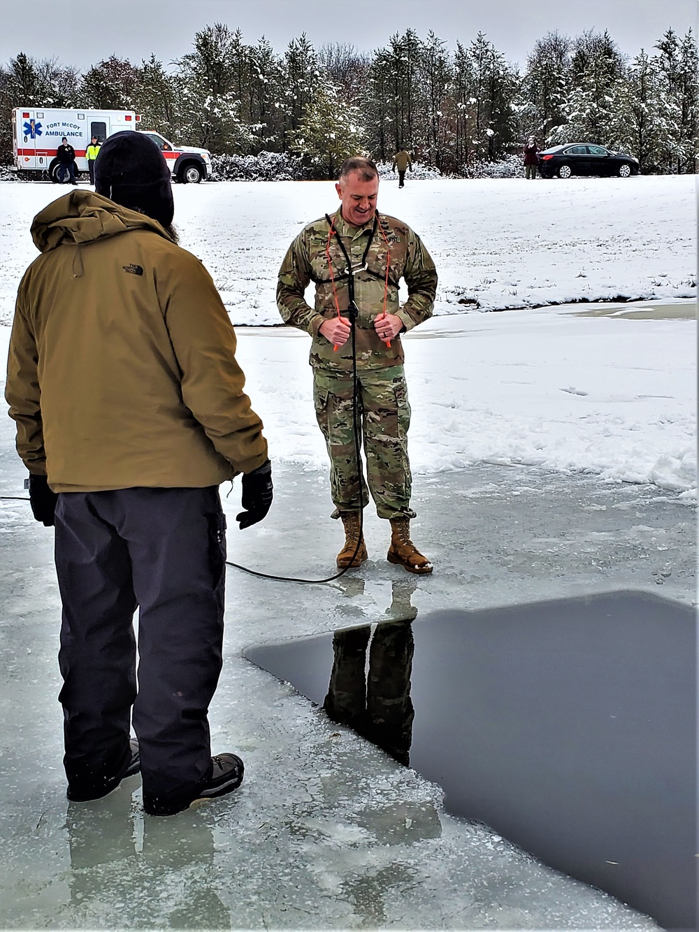 Fort McCoy garrison commander takes plunge during cold-water immersion familiarization
