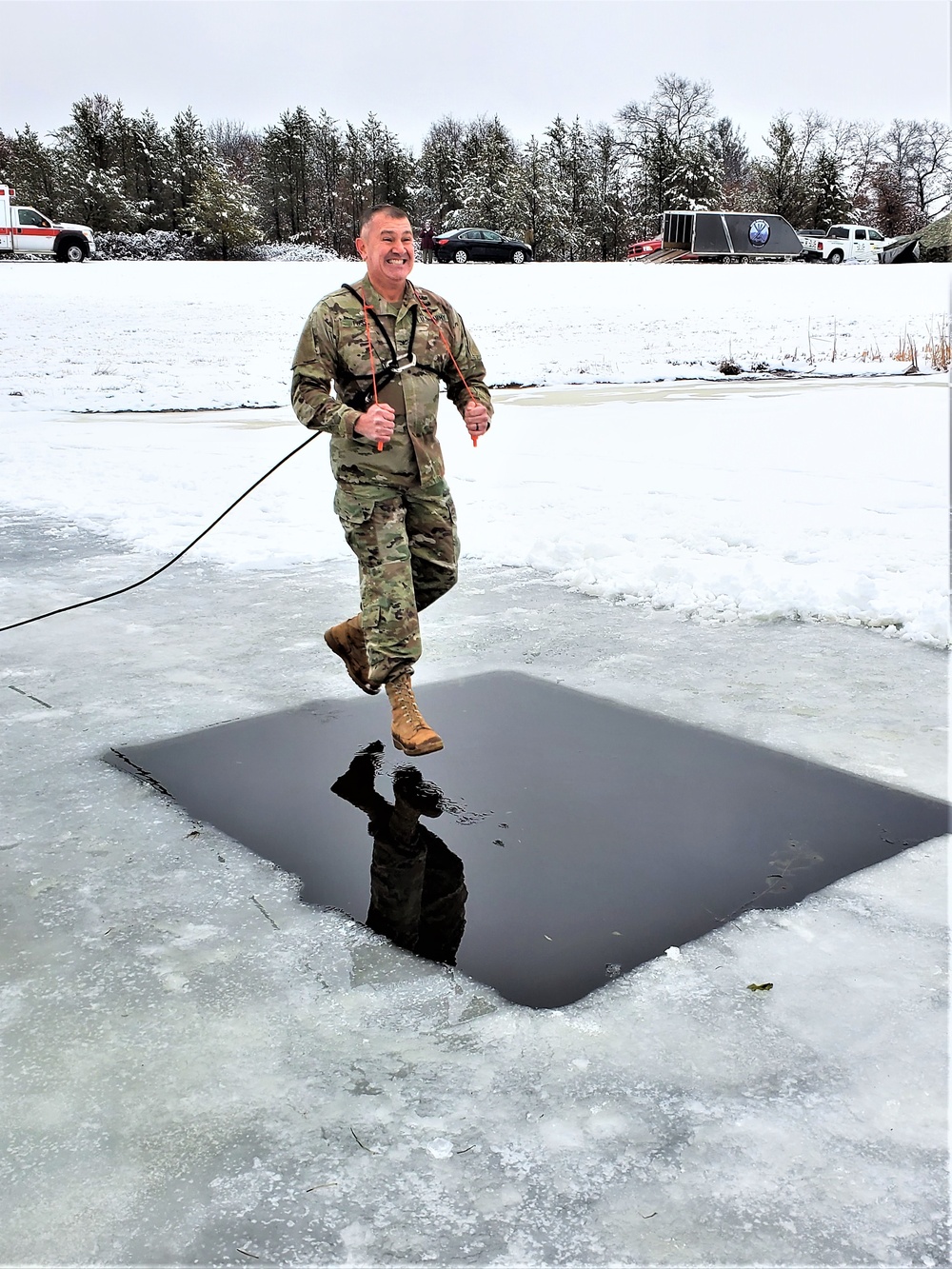 Fort McCoy garrison commander takes plunge during cold-water immersion familiarization