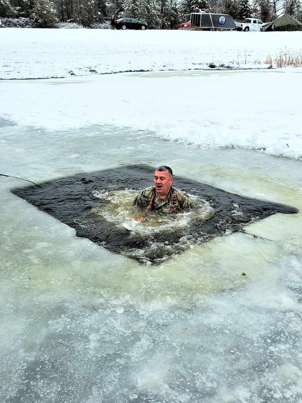 Fort McCoy garrison commander takes plunge during cold-water immersion familiarization