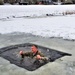 Fort McCoy garrison commander takes plunge during cold-water immersion familiarization