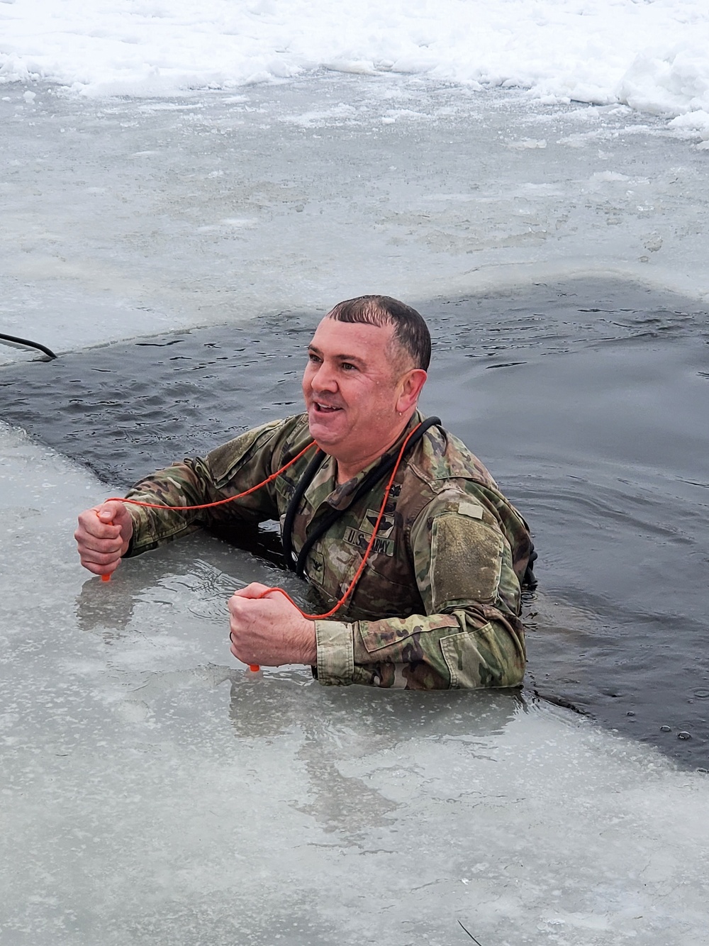 Fort McCoy garrison commander takes plunge during cold-water immersion familiarization