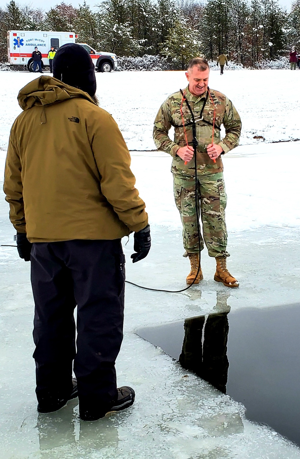 Fort McCoy garrison commander takes plunge during cold-water immersion familiarization