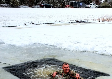 Photo Essay: Fort McCoy garrison commander takes plunge during cold-water immersion familiarization