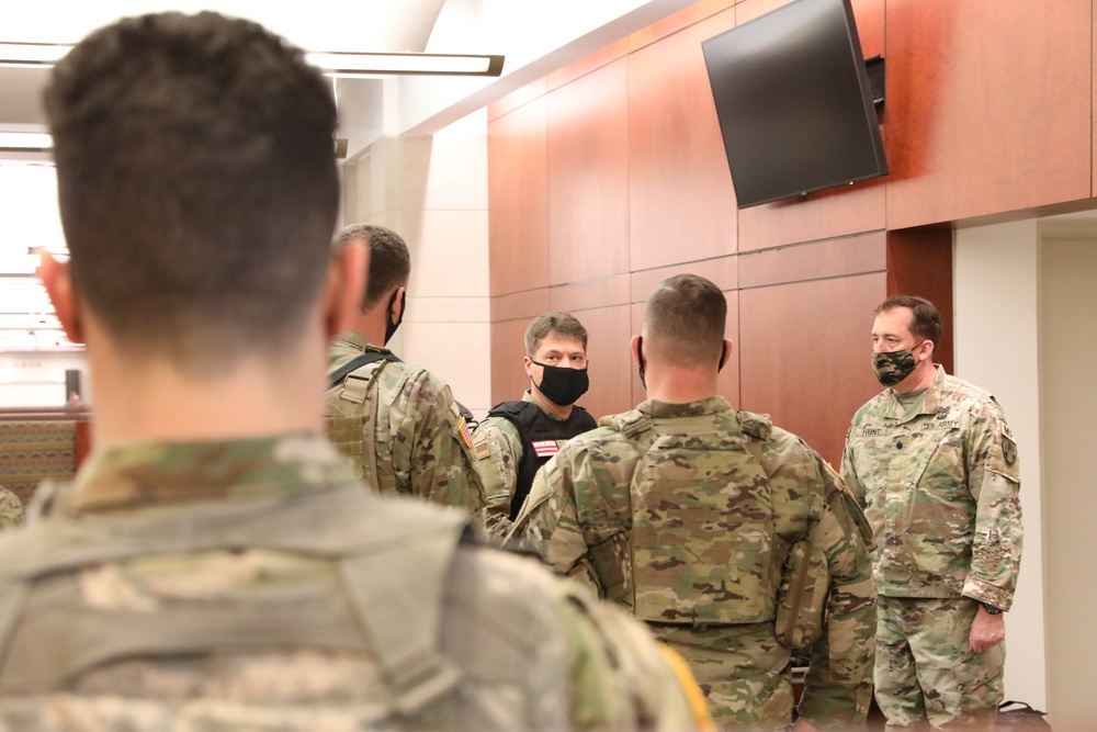 Brig. Gen. Maldonado talks with Lt. Col. Hunt with the New York National Guard.