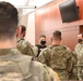 Brig. Gen. Maldonado talks with Lt. Col. Hunt with the New York National Guard.