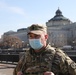 Command Sgt. Maj Niemynski stands near the U.S. Capitol building.