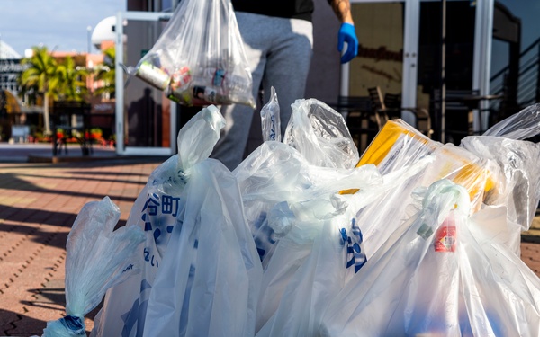 Members of the U.S. military community clean up American Village