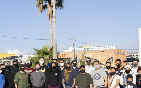 Members of U.S. military community clean up American Village