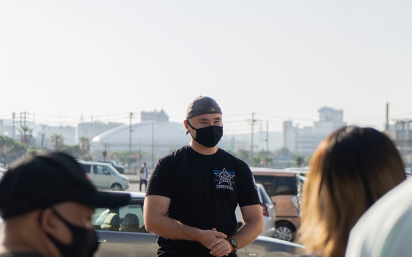Members of U.S. military community clean up American Village