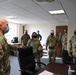 The Interim Adjutant General of New Jersey arrives for a mission briefing.