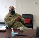The New Jersey state command sergeant major receives a briefing on the mission to support the Capitol.