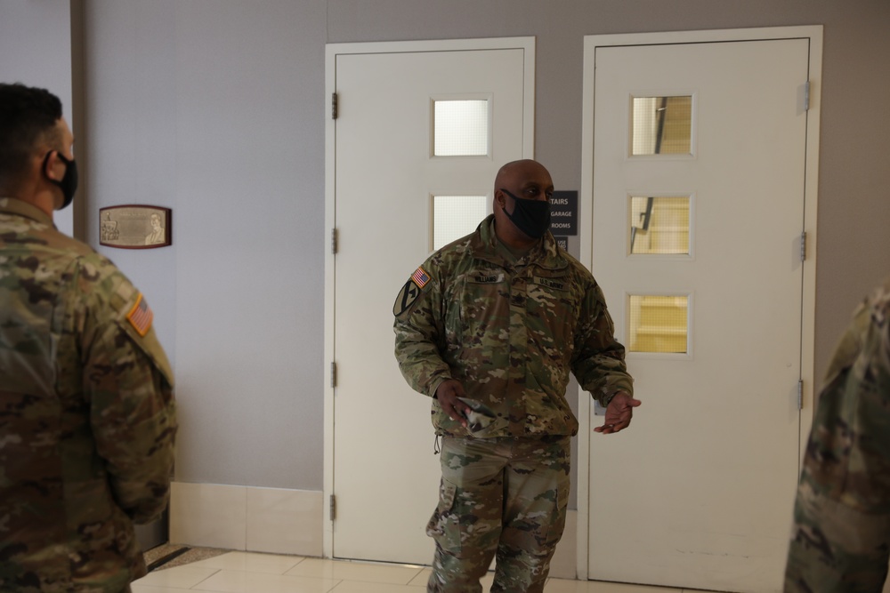Command Sgt. Maj. Williams talks to Soldiers with Company C, 1st Battalion, 114th Infantry Regiment.