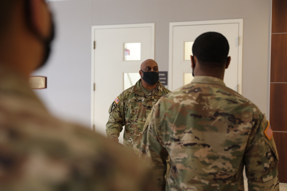Command Sgt. Maj. Williams talks to Soldiers with Company C, 1st Battalion, 114th Infantry Regiment.
