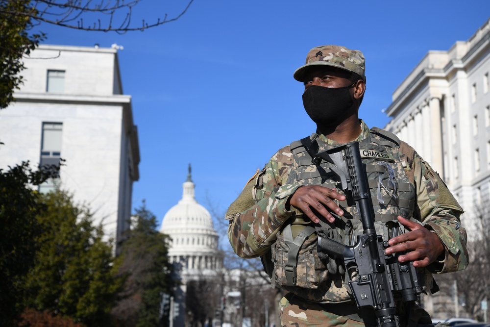 U.S. Army Sgt. Kaherdin Charles, a cavalry scout, patrols near the Capitol in Washington, D.C., Jan. 14, 2021